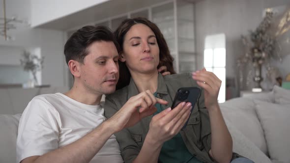 Married Woman and Man Smile Happily Reading Good News