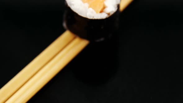 Sushi on chopsticks