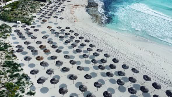 Paradise Beach for Relaxation with Umbrellas Near the Sea Sunny Weather