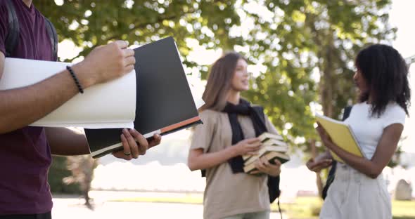 Cropped View Man Student Holding Textbook Outdoors