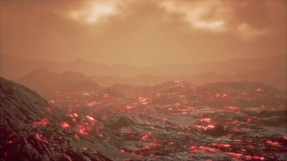 Lava Field Under Sunset Clouds on Background