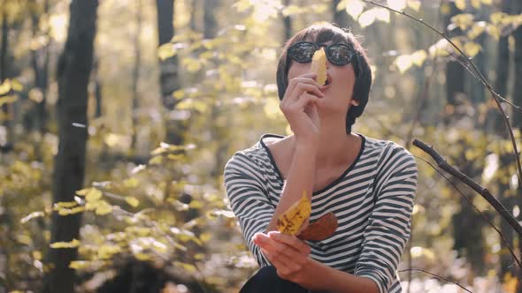 Happy Young Woman in Sunglasses and Jacket Enjoy Autumn