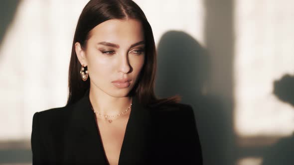 Portrait of Beautiful Young Brunette Woman with Stylish Makeup