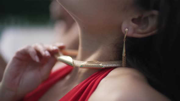 Pendant on a Girl By the Pool