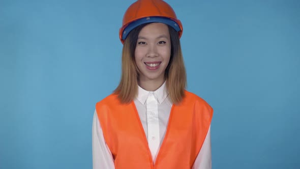 Beautiful Korean Female Builder Smiling