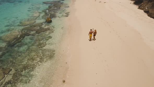 Young Couple on the Beach.