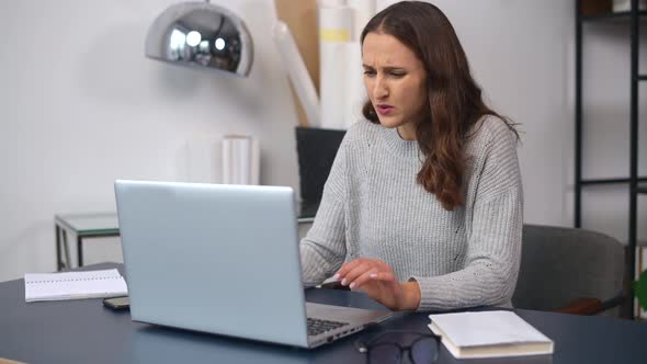 Worried Business Woman in Casual Wear Made a Mistake in the Work