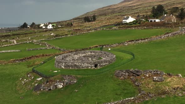 Loher Ringfort, Kerry, Ireland, March 2022. Drone orbits the ancient monument at a low altitude from