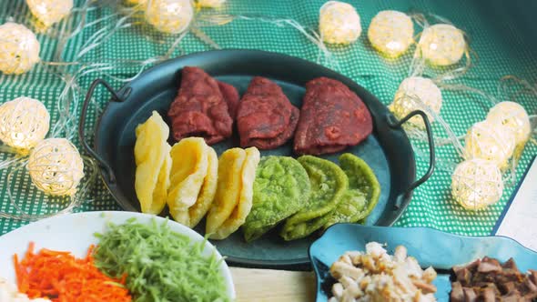 Tortillas Prepared and Decorated with Spinach and Beets