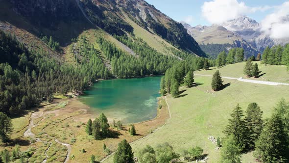 Aerial View Mountain Valley with Alpine Palpuogna Lake in Albulapass Swiss Alps