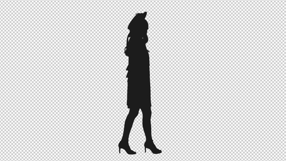 Silhouette Of Young Graceful Woman Walking In Heels alt