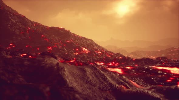 Black Lava Field with Hot Red Orangelavaflow at Sunset