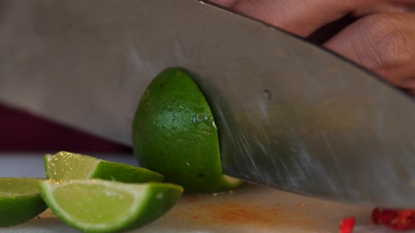 Knife Slicing Lemon