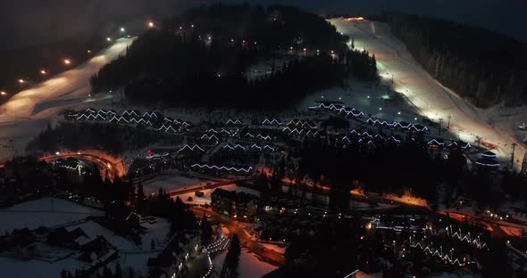 Night Illumination Cityscape Center Square Mountain Popular Ski Resort. Details of Modern House