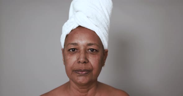 Mature african woman looking serious on camera