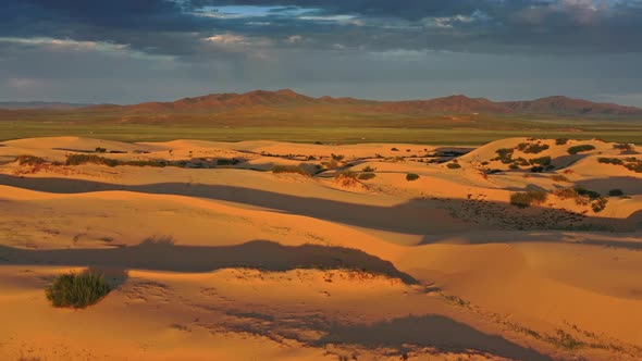 Sand Dunes in Desert at Sunrise in Mongolia