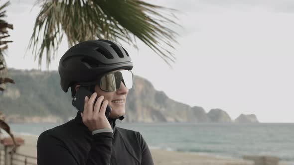 Cyclist talking on phone