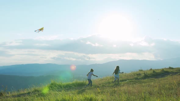 Girls Running With Kite