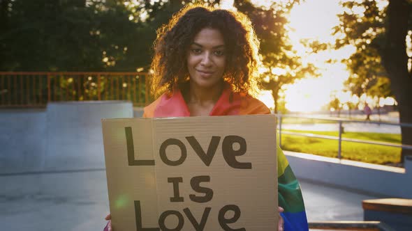 Darkskinned Lady Covering LGBT Pride Flag