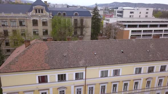 Aerial Drone Shot Over Downtown Cluj Napoca Romania Revealing the Beautiful Architecture.