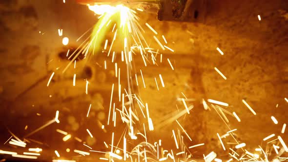 Welder welding a metal