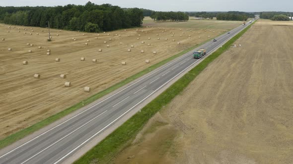 Left Hand Side Drive Trucks Driving On The Country Road