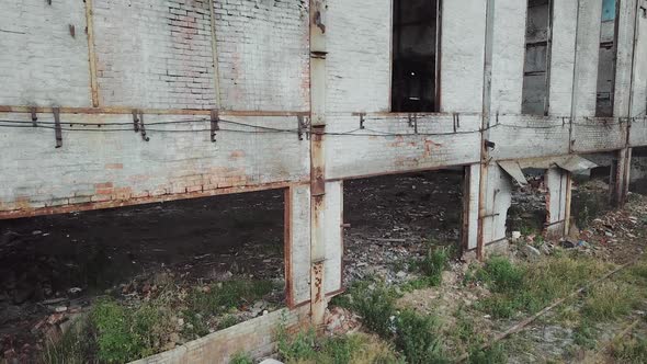 Aerial view of a destroyed factory during the war. Abandoned industrial building.