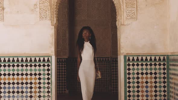 Beautiful Woman In White Walking In Alhambra