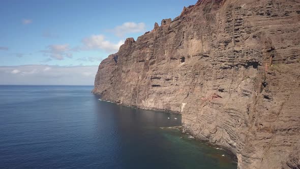 Aerial footage of Acantilados de Los Gigantes (also known as "Cliffs of the Giants"). The vertical c
