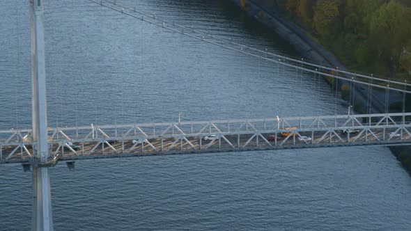 Aerial of vehicles riding on Mid-Hudson Bridge over Hudson river