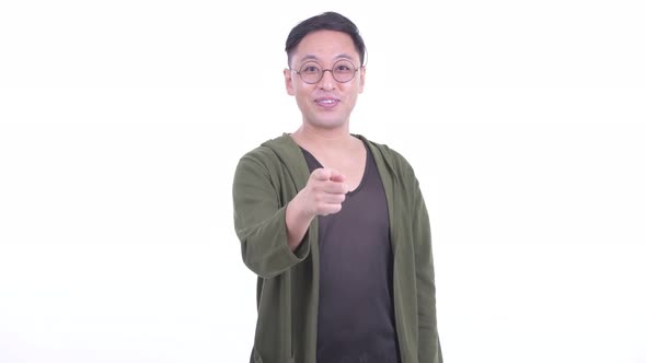 Happy Japanese Man with Eyeglasses Pointing at Camera