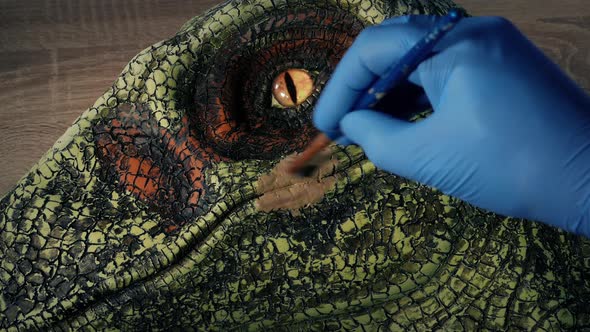 Velociraptor Head Being Painted For Display Sequence