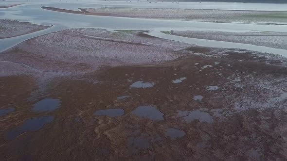 Aerial view of coastal town of Lympstone off of the English channel southwest of England. The beach