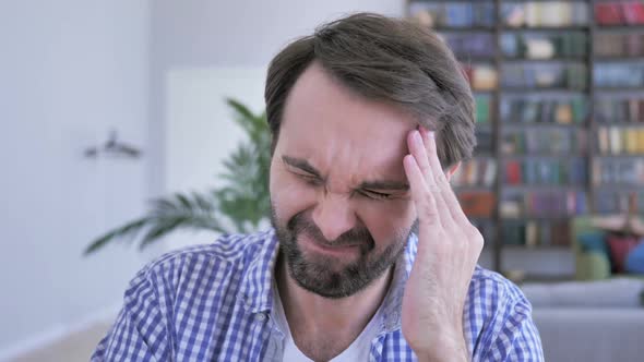 Severe Headache Tense Casual Beard Man Ith Head Pain at Work in Office