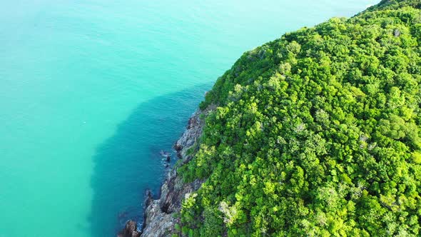 Natural fly over abstract view of a white sand paradise beach and blue ocean background in hi res 4K