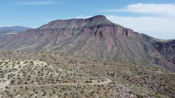 Drone video of Arizona mountains and desert with cactus.