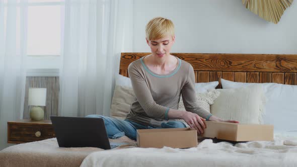 Excited Woman Consumer Open Cardboard Box Get Postal Parcel From Internet Store