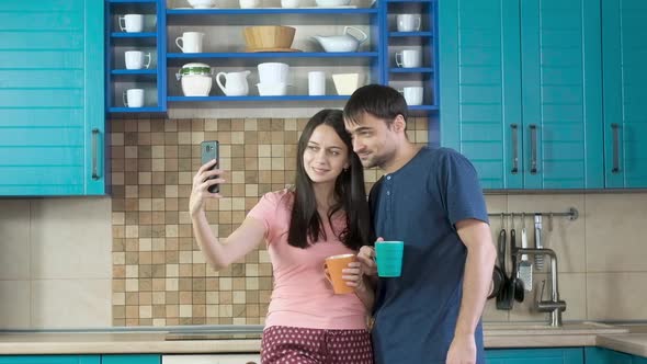 Couple romantic selfie for Internet on your smartphone. Cheerful morning.