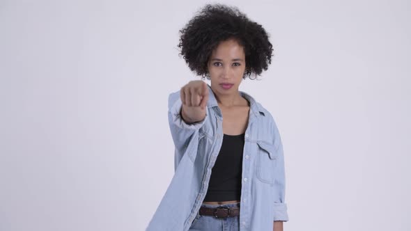 Young Beautiful African Woman Pointing at Camera