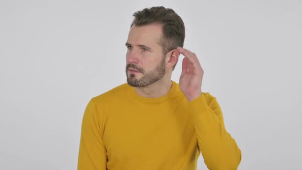 Portrait of Middle Aged Man Listening Carefully