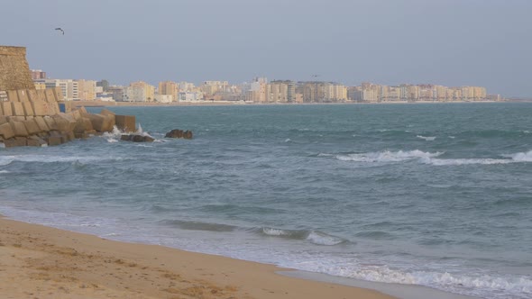 Waves reaching a beach