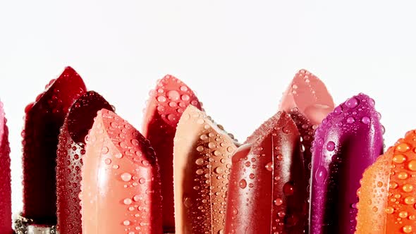 Colorful Lipstick Palette Rotation on White Background