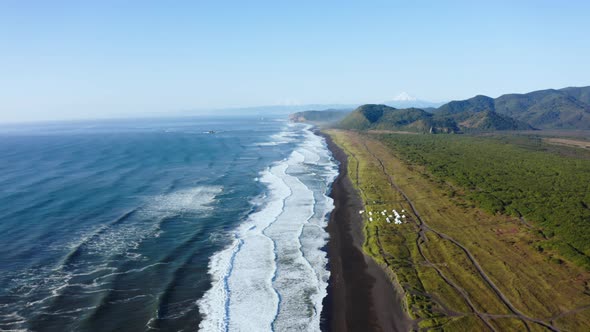 Aerial View Sunny Khalaktyrsky Beach with Black Sand on Kamchatka