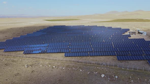 Solar Power Station with Panels Standing in Rows