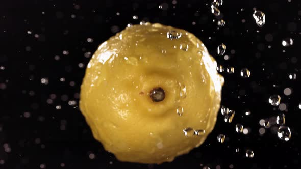 Flying of Lemon in Black Background in Slow Motion