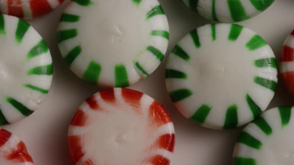 Rotating shot of spearmint hard candies - CANDY SPEARMINT 062