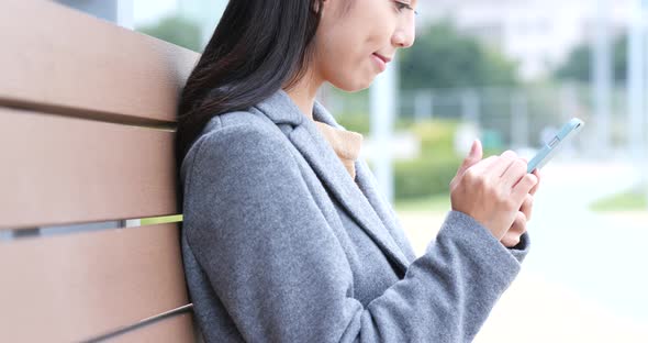 Woman use of smart phone in Hong Kong