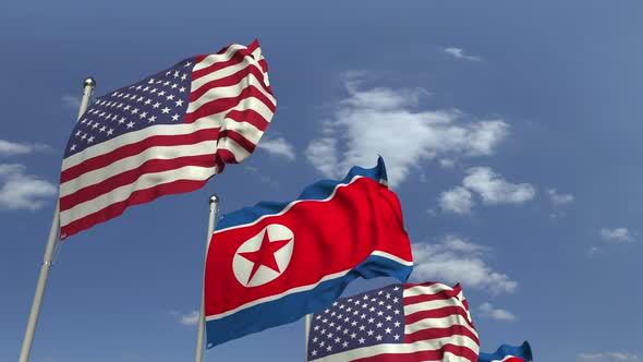 Waving Flags of North Korea and the USA