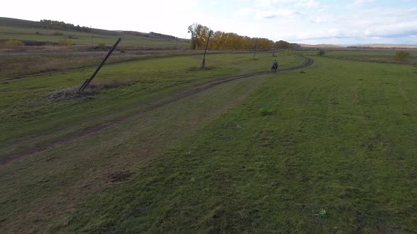 Man on Horse in Steppes Siberia