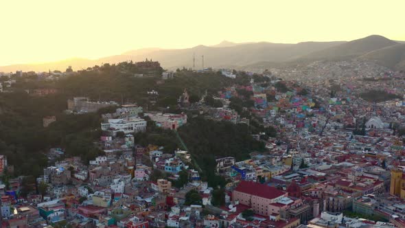 AERIAL: Guanajuato City and The Pipila, Mexico (Flying Over)